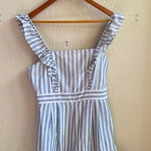 White and blue Vinci full length romper.